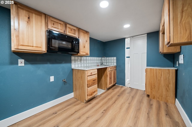 2360 N R St, Washougal, WA 98671 - kitchen with black microwave, light wood-type flooring, light countertops, tasteful backsplash, and recessed lighting