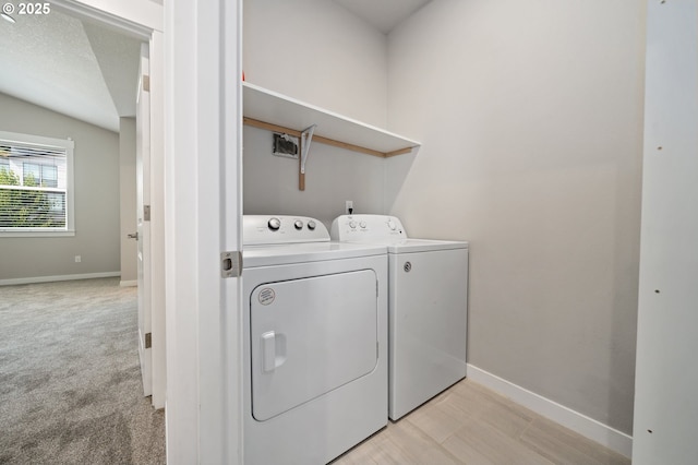 2360 N R St, Washougal, WA 98671 - washroom featuring washing machine and clothes dryer and baseboards