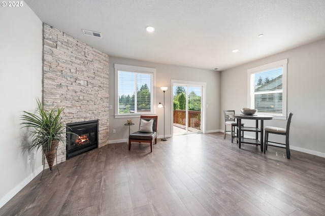 2360 N R St, Washougal, WA 98671 - living area with a stone fireplace and wood finished floors