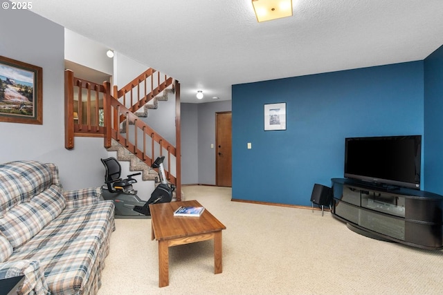 living room with stairway, carpet, baseboards, and a textured ceiling