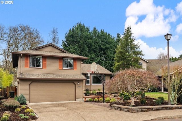 view of front of home featuring a garage, a shingled roof, driveway, and fence