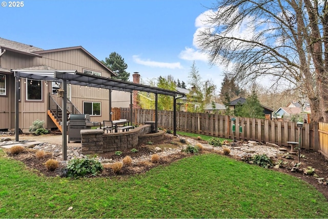 view of yard with a patio, fence, and a pergola