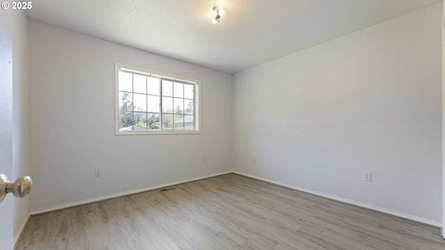 151 E Date St, Powers, OR 97466 - spare room featuring wood finished floors and baseboards
