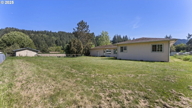 151 E Date St, Powers, OR 97466 - view of yard with a forest view