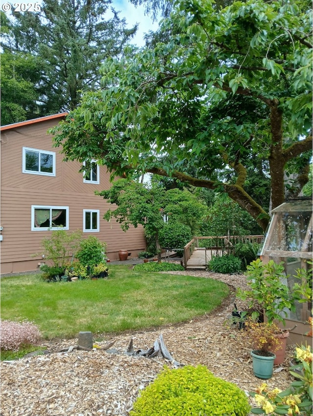 9655 8th St, Bay City, OR 97107 - view of green lawn featuring a wooden deck