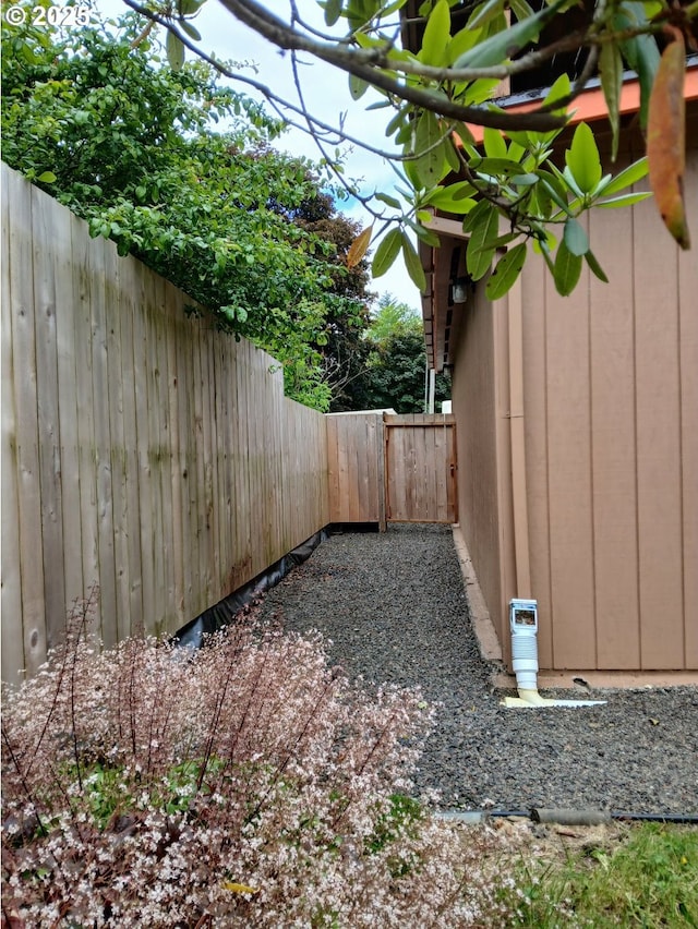 9655 8th St, Bay City, OR 97107 - fenced backyard with a gate