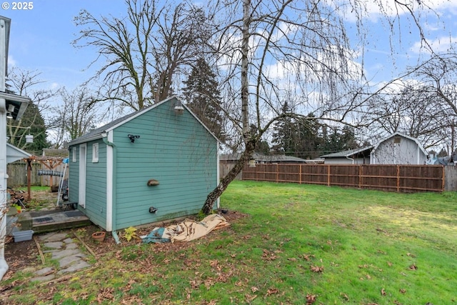 view of yard with an outdoor structure