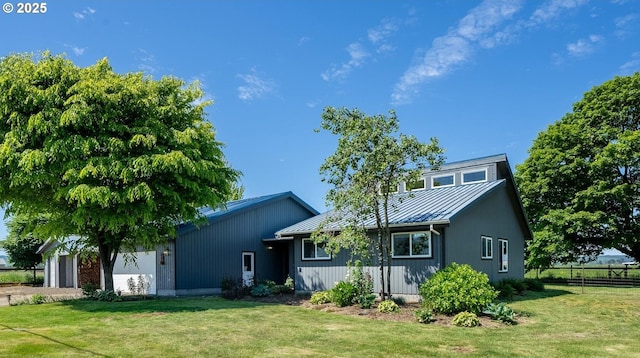 1770 Mccormick Loop Rd, Tillamook, OR 97141 - back of house with a standing seam roof, metal roof, and a garage