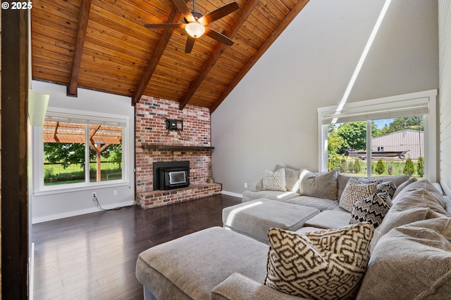 1770 Mccormick Loop Rd, Tillamook, OR 97141 - living room with high vaulted ceiling, wood ceiling with exposed beams, wood-type flooring, ceiling fan, and baseboards