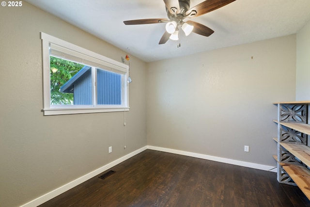 1770 Mccormick Loop Rd, Tillamook, OR 97141 - spare room featuring baseboards, wood finished floors, and a ceiling fan