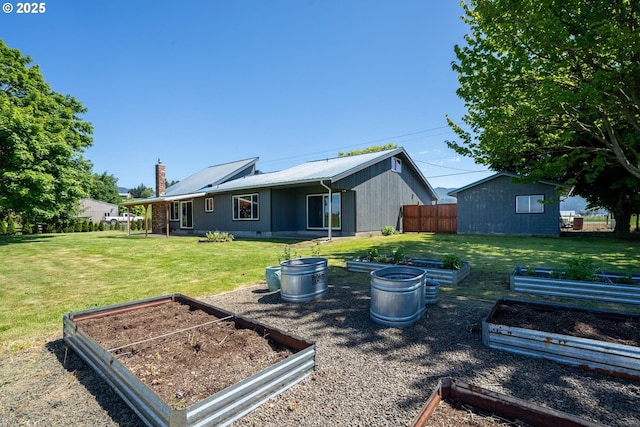 1770 Mccormick Loop Rd, Tillamook, OR 97141 - rear view of house with a garden and a chimney