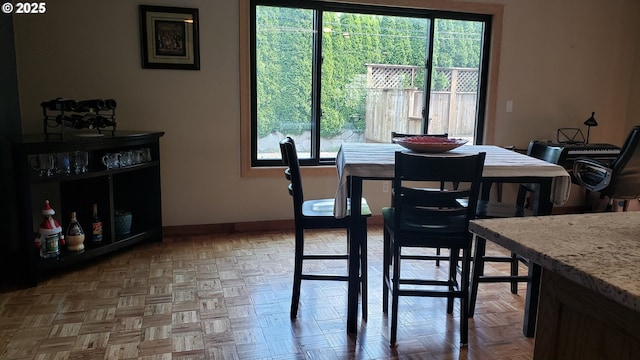 dining room with recessed lighting