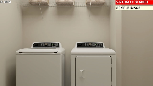 laundry room featuring laundry area and washer and dryer