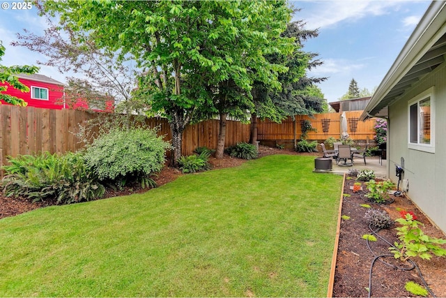 view of yard with a patio area