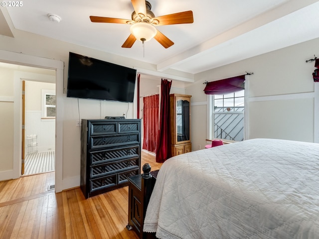 487 Arkansas Ave, Vernonia, OR 97064 - bedroom featuring light wood-style floors, beam ceiling, and ceiling fan