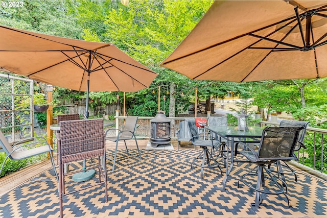 487 Arkansas Ave, Vernonia, OR 97064 - view of patio featuring outdoor dining space and fence