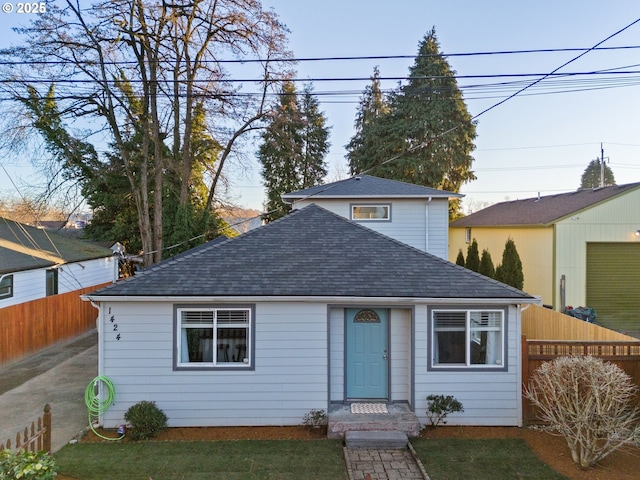 view of front of house with a front lawn