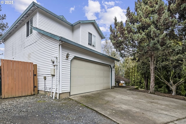 view of property exterior with a garage