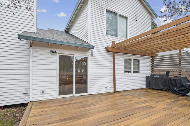 wooden terrace with a pergola