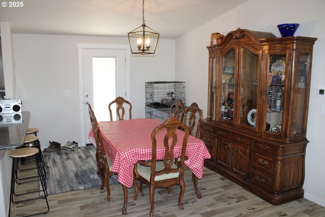 526 SE 15th St, Pendleton, OR 97801 - dining room with light wood-style flooring and a chandelier