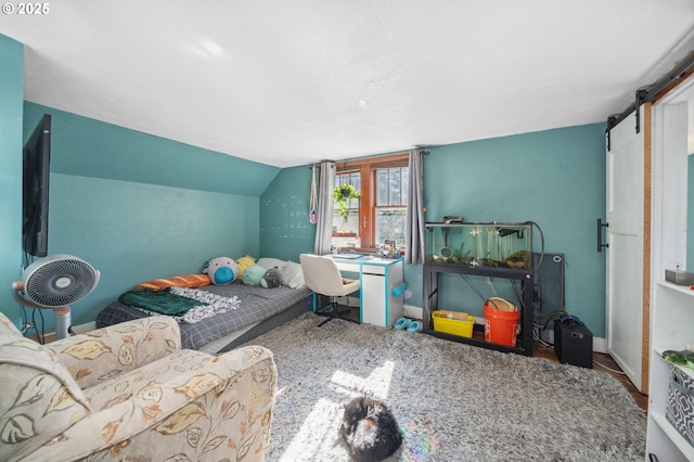 22405 NE 167th Ave, Battle Ground, WA 98604 - bedroom featuring a barn door and lofted ceiling