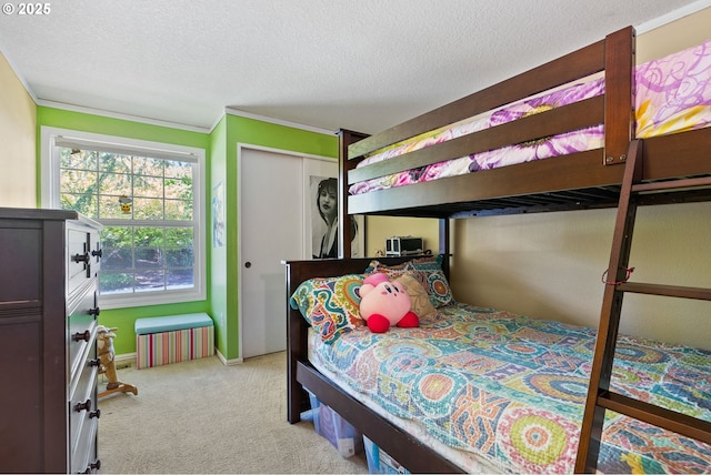 4134 Orchard Way, Lake Oswego, OR 97035 - bedroom with light colored carpet, a textured ceiling, crown molding, and a closet