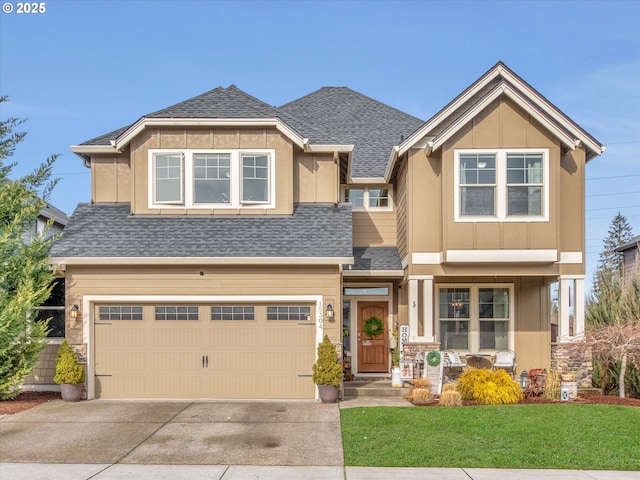 craftsman-style home with a garage and a front yard