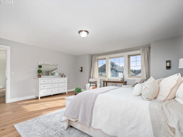 hall with light hardwood / wood-style floors