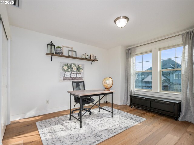 bedroom with light wood-type flooring