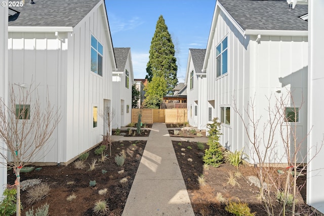 2291 N Humboldt St, Portland, OR 97217 - view of property exterior featuring board and batten siding and a shingled roof