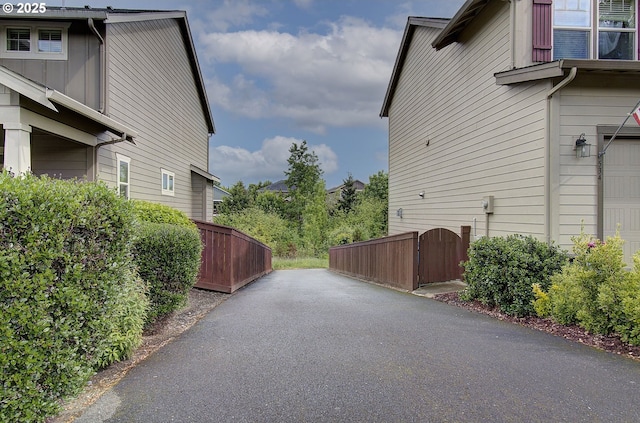 530 N Helens View Dr, Ridgefield, WA 98642 - view of side of home with a gate and an attached garage