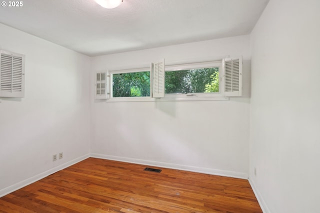 3185 Granada Way, Salem, OR 97302 - spare room with plenty of natural light, wood finished floors, and baseboards