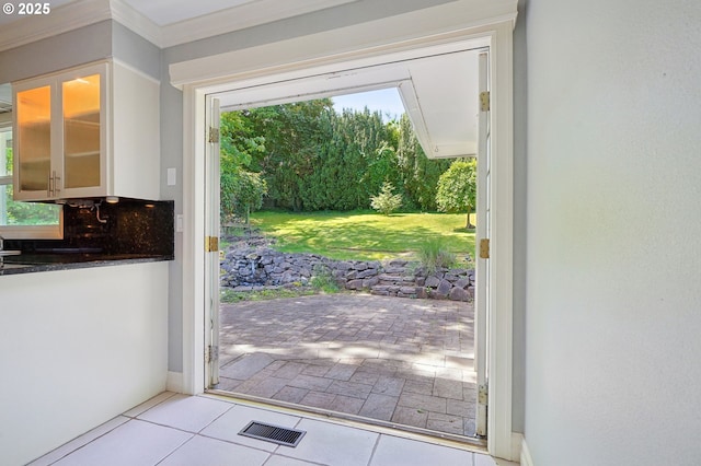 3185 Granada Way, Salem, OR 97302 - entryway featuring tile patterned floors, healthy amount of natural light, and ornamental molding
