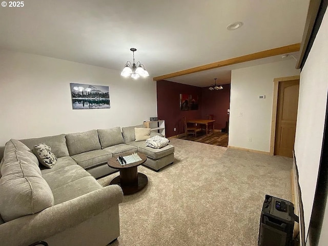 55778 SW Scoggins Valley Rd, Gaston, OR 97119 - living area with a chandelier, carpet flooring, and baseboards