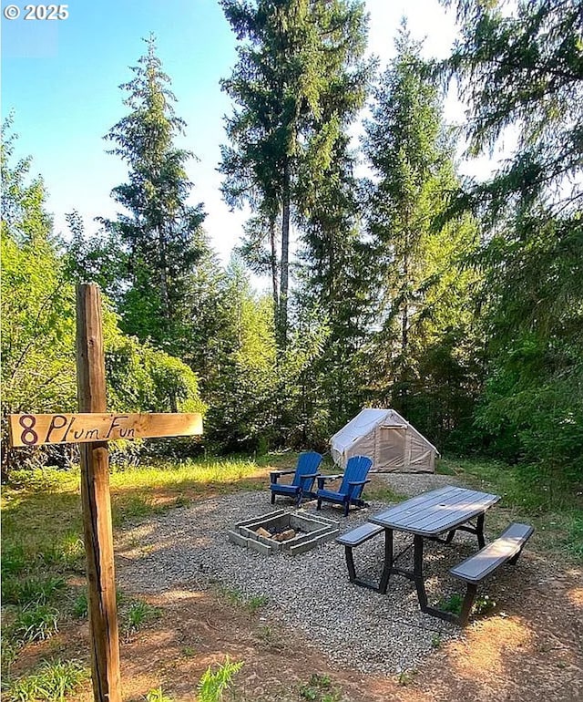 55778 SW Scoggins Valley Rd, Gaston, OR 97119 - view of yard featuring an outdoor fire pit