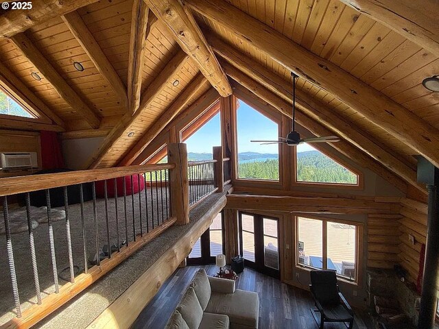55778 SW Scoggins Valley Rd, Gaston, OR 97119 - living room featuring wooden ceiling, wood-type flooring, log walls, and a ceiling fan