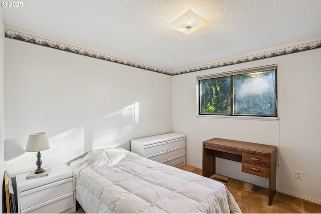 bedroom with a textured ceiling