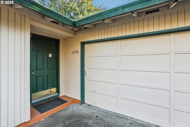 property entrance featuring a garage