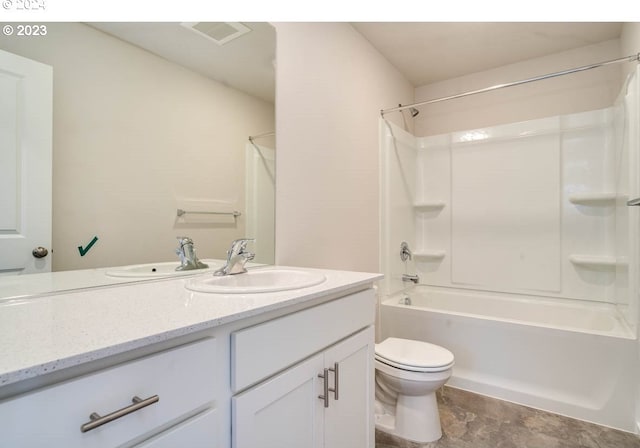 full bathroom featuring shower / bathing tub combination, vanity, and toilet