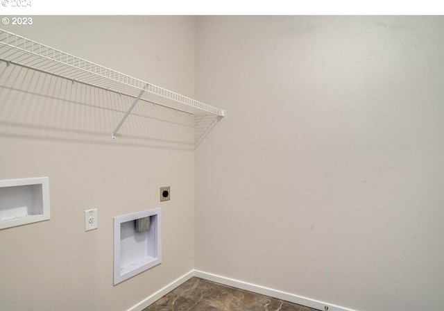 laundry room with electric dryer hookup and washer hookup