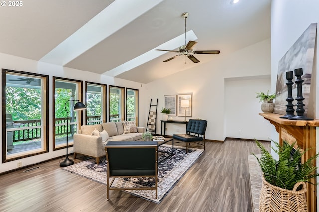23535 SW Newland Rd, Wilsonville, OR 97070 - living area with healthy amount of natural light, wood finished floors, ceiling fan, and high vaulted ceiling