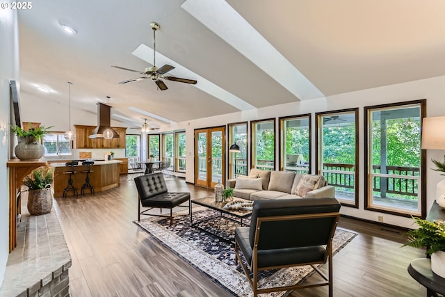 23535 SW Newland Rd, Wilsonville, OR 97070 - living room featuring a ceiling fan, lofted ceiling, wood finished floors, and french doors