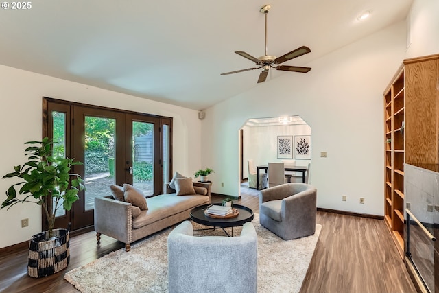 23535 SW Newland Rd, Wilsonville, OR 97070 - living area with french doors, vaulted ceiling, wood finished floors, arched walkways, and ceiling fan