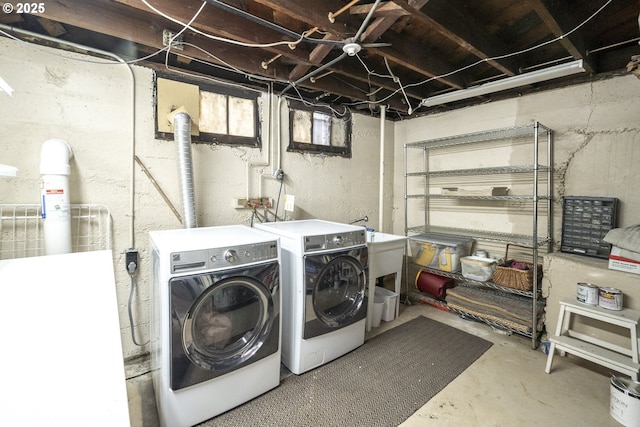 washroom with washer and dryer and laundry area