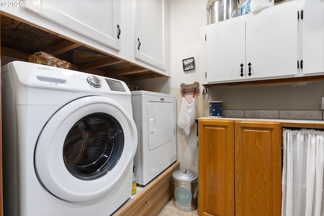 24150 NW Green Mountain Rd, Banks, OR 97106 - washroom featuring cabinet space and independent washer and dryer
