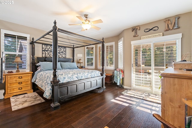 24150 NW Green Mountain Rd, Banks, OR 97106 - bedroom featuring wood finished floors, multiple windows, baseboards, and ceiling fan