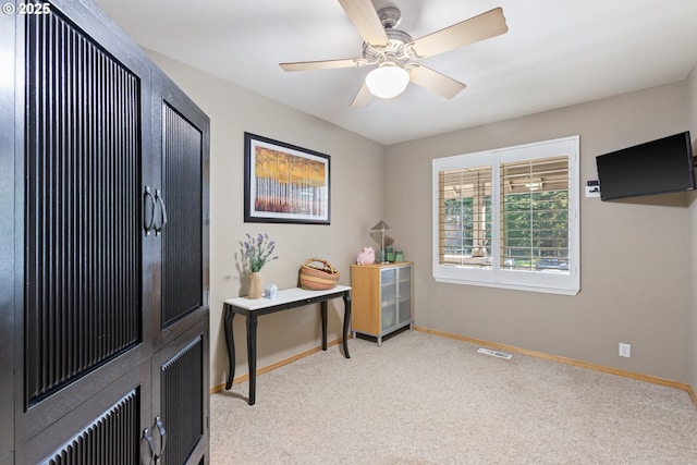 24150 NW Green Mountain Rd, Banks, OR 97106 - home office featuring light colored carpet, baseboards, and a ceiling fan