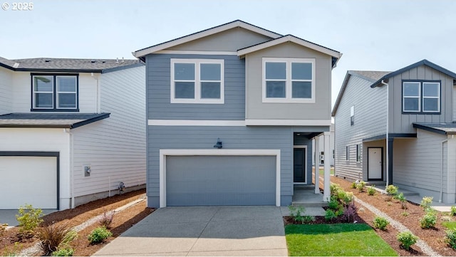 view of front of home with a garage and concrete driveway