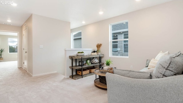 interior space with recessed lighting, visible vents, and baseboards