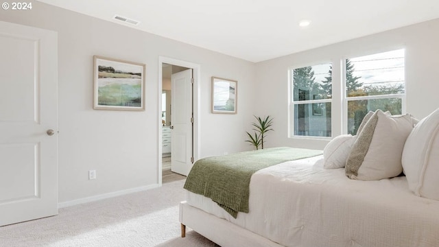 bedroom featuring carpet, visible vents, and baseboards